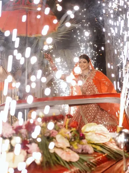Another angle of the bride's dazzling entry, showcasing the scale of the pyrotechnics and the sheer glamour of the moment. I plan for visual impact from every viewpoint.