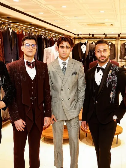 A lineup of our diverse suit and tuxedo collection, showcasing different styles, colors, and fits for any occasion.