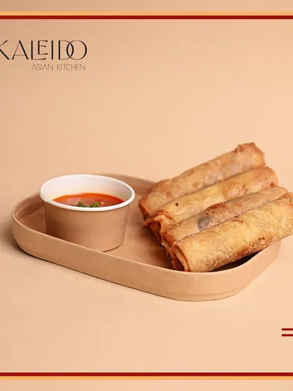 Crispy, golden, and delicious. My vegetarian spring rolls are the perfect snack for any occasion, served with a sweet and spicy dipping sauce.