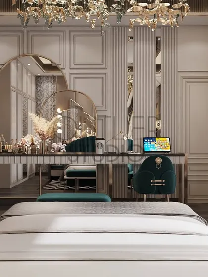 A look at the elegant and functional dressing-cum-study unit in the daughter's bedroom. The design features a large triple-arched mirror, a sleek desk, and a plush velvet chair, combining practicality with glamour.
