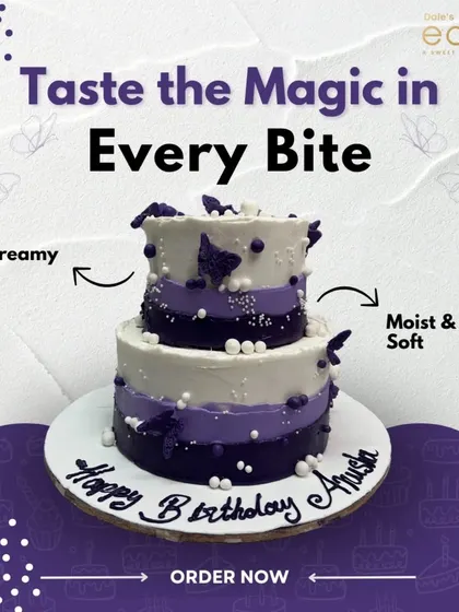 Taste the magic in every bite. This two-tier cake in shades of purple is decorated with delicate butterflies, creating a moist, soft, and magical birthday centerpiece.