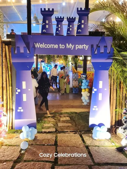 A custom castle gate entrance for a Frozen-themed party, making every guest feel like they are entering the kingdom of Arendelle.
