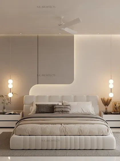 Another view of the grey and white minimalist bedroom, highlighting the curved, backlit headboard that adds a soft, architectural element to the space.
