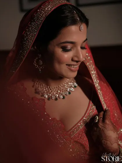 The bride's happy and radiant expression says it all. The makeup was designed to be elegant and clean, ensuring she felt comfortable and beautiful throughout her reception.
