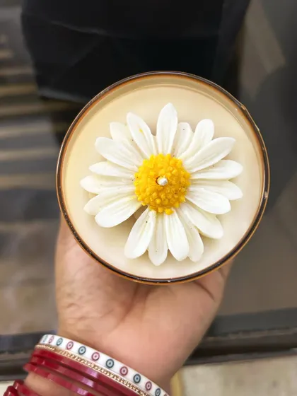 An overhead shot of the daisy candle, showing the perfect flower shape.