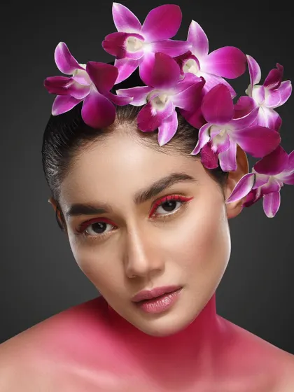 From my 'She was made to Bloom' series, this portrait combines floral styling with creative makeup. The goal was to create a vibrant, artistic image that feels both natural and fantastical.