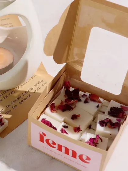 Unwind and indulge. Our rose petal wax melts in their custom-branded box.