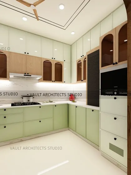 A glimpse into a modular kitchen I designed, featuring a fresh, two-tone color scheme with sage green and natural wood cabinets. The 3D render details the layout, including the built-in oven and chimney placement for a clean look.