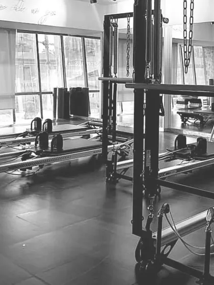 Another view of our studio, showing the natural light and well-maintained equipment. This is where your transformation begins.