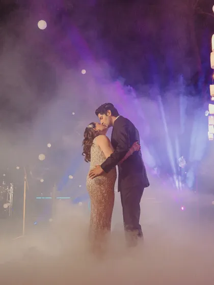 The first dance as husband and wife. We set the stage for this magical moment with ethereal low-lying fog and dramatic spotlights, creating a dreamy, cloud-like effect that made it feel as if the couple were the only two people in the world.