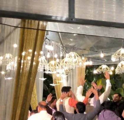 The party continues with everyone dancing together.