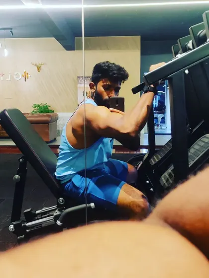 Taking a moment after a heavy set on the leg press. This machine is a staple in my leg training for building mass and strength in the quads and glutes.