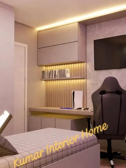 A cool gaming setup with a PS5, a gaming chair, and integrated shelving with backlighting.