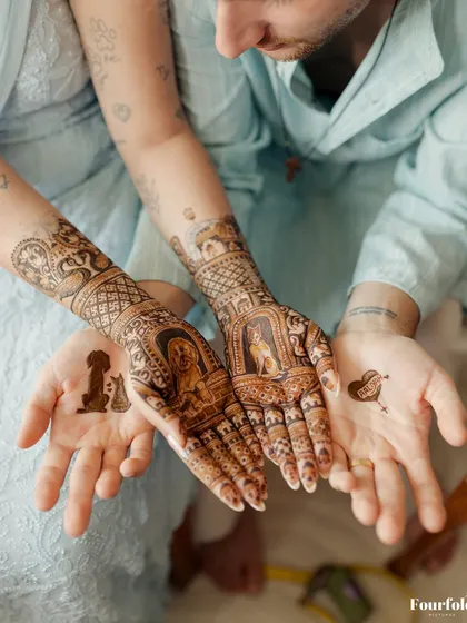 Mehendi is a story told on the skin. This bride chose to include portraits of her beloved pets in her bridal henna, a beautiful and personal touch that I absolutely loved helping to coordinate.