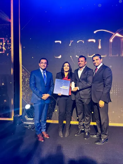 Receiving the EuroKids Excellence Award 2025 on stage. I am grateful for this recognition of my dedication to innovation and best practices in preschool education.