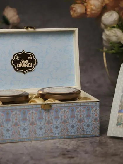 A simple yet elegant dry fruit box for Diwali. The pastel blue color and minimalist design make it a classy choice for corporate or personal gifting.