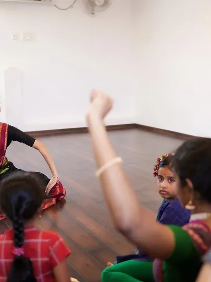 Leading the class from the front. The open layout ensures every student has a clear view of the instructor.