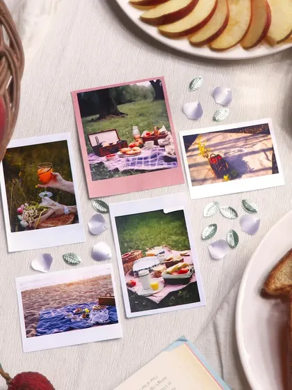 The polaroids and floral sequins add a touch of whimsy and dimension to your creations.