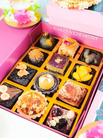 This assorted mithai box from my Diwali collection is a modern take on traditional sweets. It features a variety of bite-sized treats like mini tarts, brownies, and fusion fudge squares.