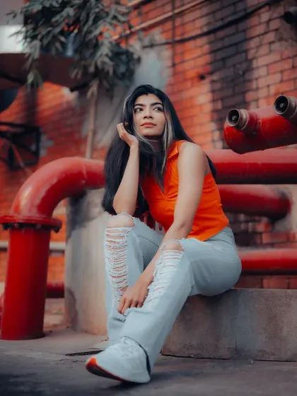 A duplicate of image 16, this industrial setting with red pipes provides a great contrast for a strong urban fashion image.