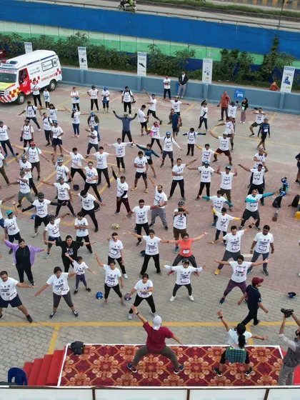 An aerial view of our Zumba warm-up session at the Decathlon Sarjapur Cyclothon. It's an amazing sight to see so many people moving together, getting ready for the main event.
