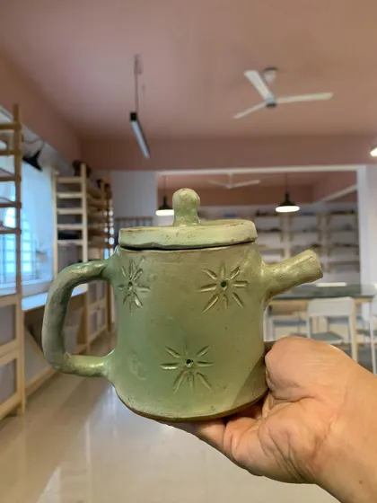 This sweet little teapot with a star pattern was hand-built by an 11-year-old student. It’s a perfect example of the whimsical and wonderful things that can be made with just a little clay and a lot of imagination.