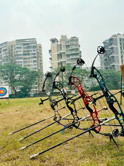 A close-up of our lineup of compound bows, showcasing the professional equipment available for our students.
