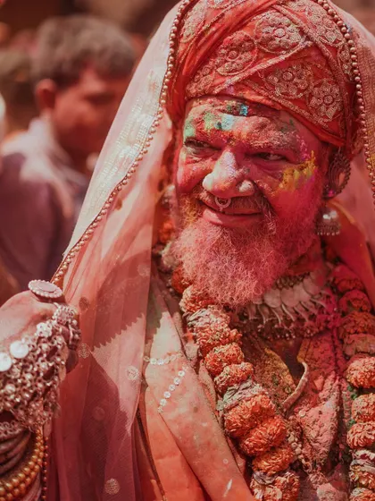 A vibrant collection of images from the Holi celebrations in Braj, specifically Nandgaon. This series captures the pure ecstasy of the festival, with portraits of devotees, men dressed as gopis, and crowds dancing in a cloud of colors.