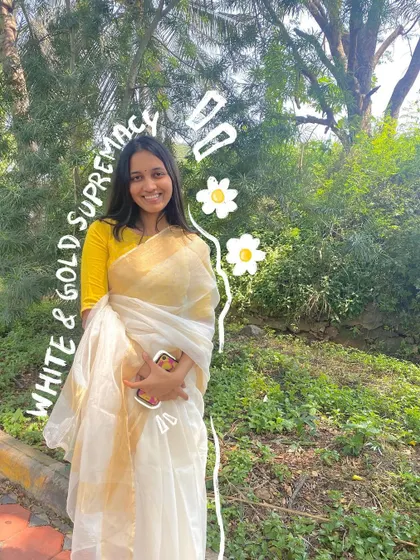 White and gold supremacy. This classic Kerala-style saree is timeless, and the doodles add a modern, personal touch.