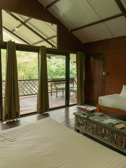 Your room opens up to a spacious balcony, blurring the line between your cozy indoor space and the vibrant nature outside.