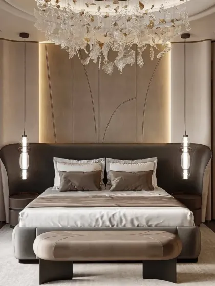 For those who desire ultimate luxury, we design opulent bedroom interiors. This master bedroom features a statement winged headboard, exquisite pendant lighting, and a stunning leaf-motif chandelier, creating a space that feels like a five-star hotel suite.