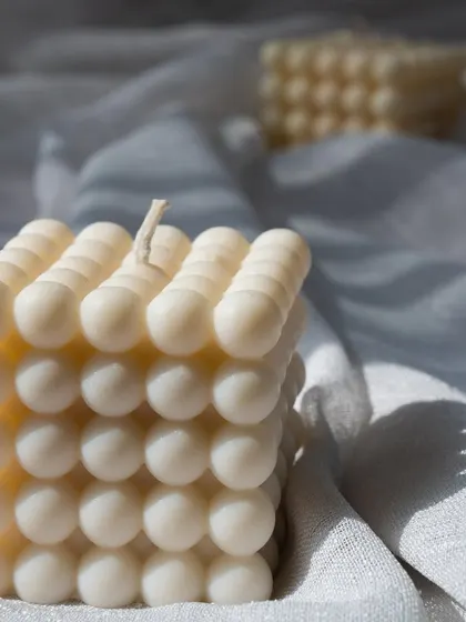 A close-up of our large bubble candle, showing the beautiful texture and shadows.