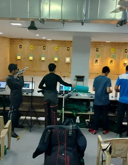 A glimpse of a typical training day at the Eminent Shooting Range. The image shows the layout of the lanes, the electronic target systems, and the focused atmosphere I cultivate for my shooters.