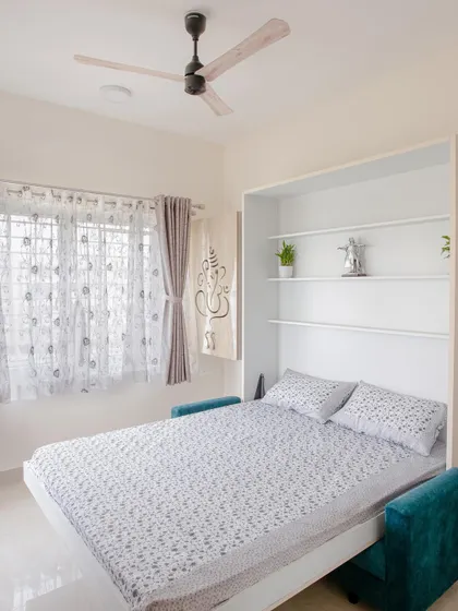 This Murphy bed with an integrated sofa is the perfect solution for a guest room or a studio apartment. It transforms from a stylish seating area to a comfortable bed in seconds.