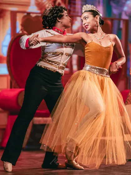 A dynamic shot of our King and Queen in performance. Their energy and chemistry captivated the audience throughout the show.