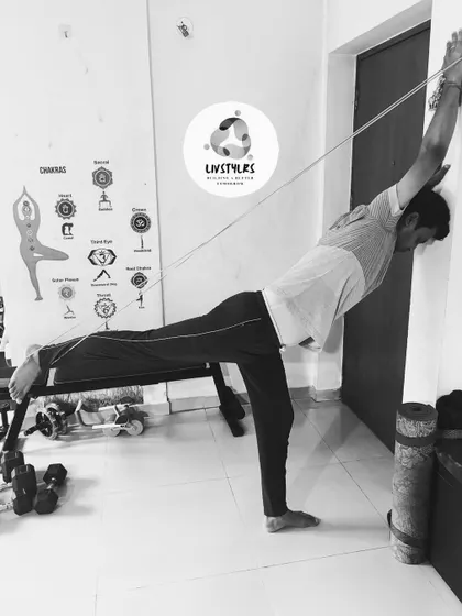 Using a resistance band and bench, this client is performing a single-leg Romanian deadlift variation. This exercise is fantastic for improving balance, hamstring flexibility, and glute strength.