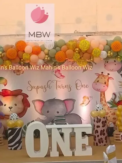 A detailed shot of the jungle party stage, focusing on the adorable elephant, lion, and giraffe characters that make the theme so special.