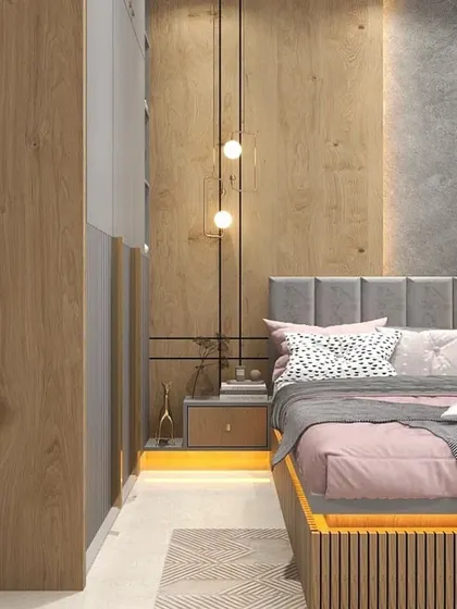 Another angle of the modern bedroom, focusing on the pendant lighting and the sleek, handle-less wardrobe design.