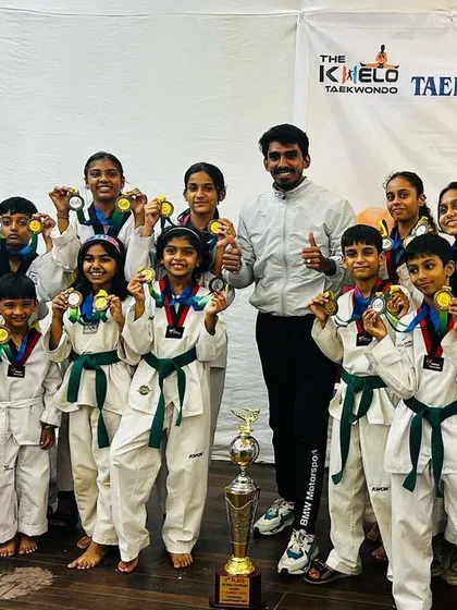 The full team with our trophy and medals. Every student contributed to this success.