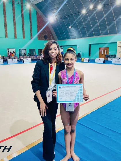 I am incredibly proud of my 10-year-old student for winning her first National medal in just one year of training. This is a testament to her hard work and the effectiveness of our competition-focused program.