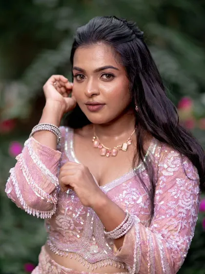 A close-up of a model's reception look, with soft makeup that enhances her natural beauty.