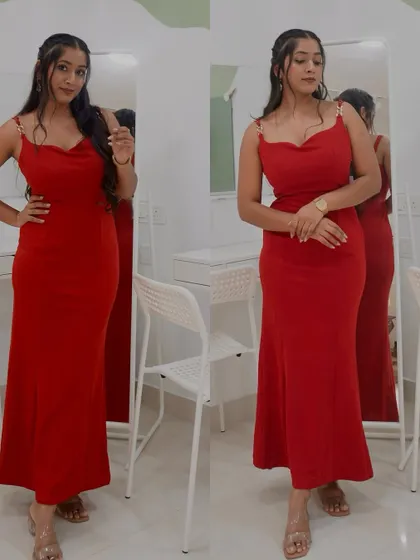A full-length view of the red gown, perfect for a cocktail party or reception.