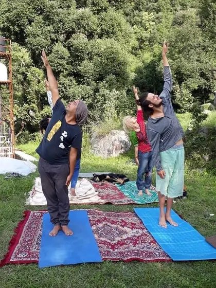 Teaching a class in the beautiful outdoors of Dharmkot. It's wonderful to see students of all ages and backgrounds connect with their breath and body in nature.