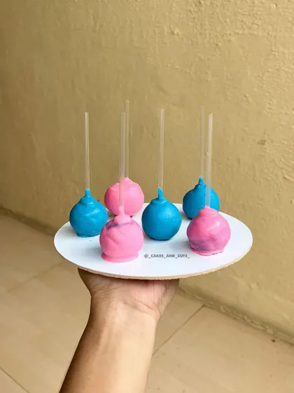 Pink and blue cake pops, another great bite-sized treat for a baby shower dessert table.