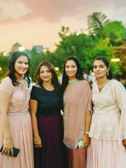 With the happy family and guests at the baby naming ceremony for Siddhi and Kushal's child. My goal is to create a joyous and seamless event where the hosts can relax and enjoy the moment.