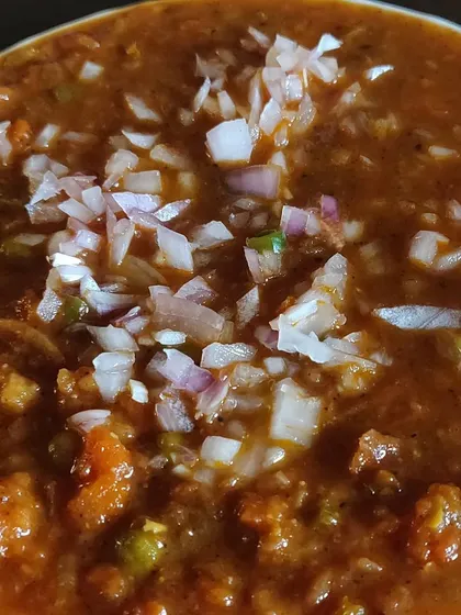 The vibrant colors of my pav bhaji, showing the mix of peas, carrots, and other vegetables.