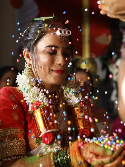 A joyful moment from a traditional wedding ceremony. My makeup is designed to be long-lasting, ensuring you look perfect through all the rituals and celebrations of your special day.