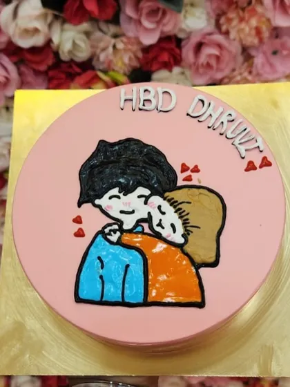 Another example of a cute, hand-drawn cake, this one showing a couple hugging. It's a sweet and simple design for an anniversary or birthday.