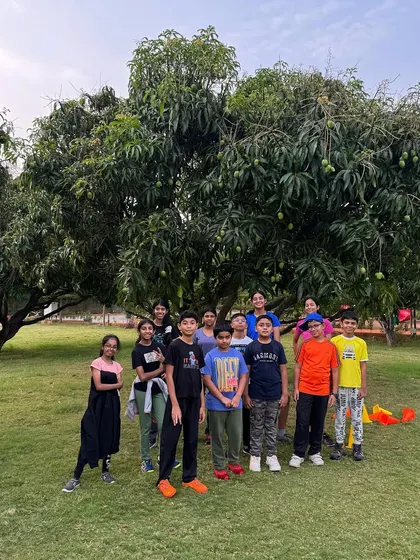 A group of smiling boys from the Young Adventurers camp posing for a photo. Our camps are a place to make new friends and build lasting bonds.