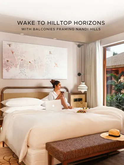 Wake up to hilltop horizons. Our suites are designed for serene mornings, where you can enjoy a private breakfast in bed while gazing out at the natural beauty from your balcony.